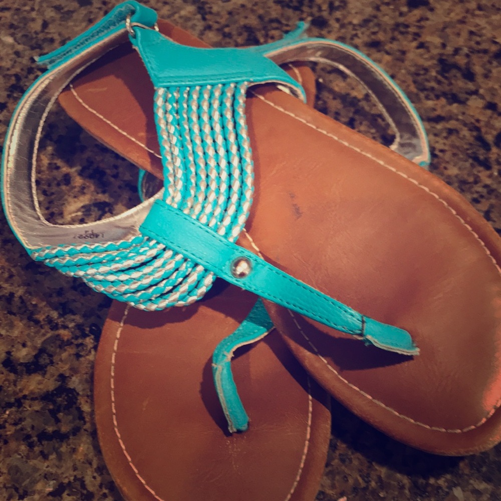 Sandals with strap.